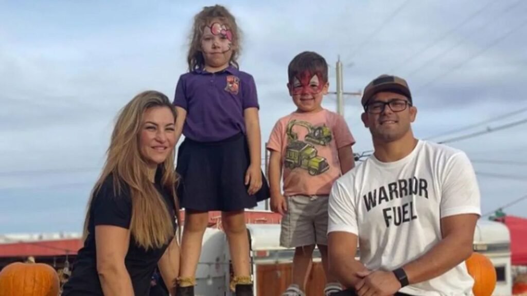 Miesha Tate with his husband and child.